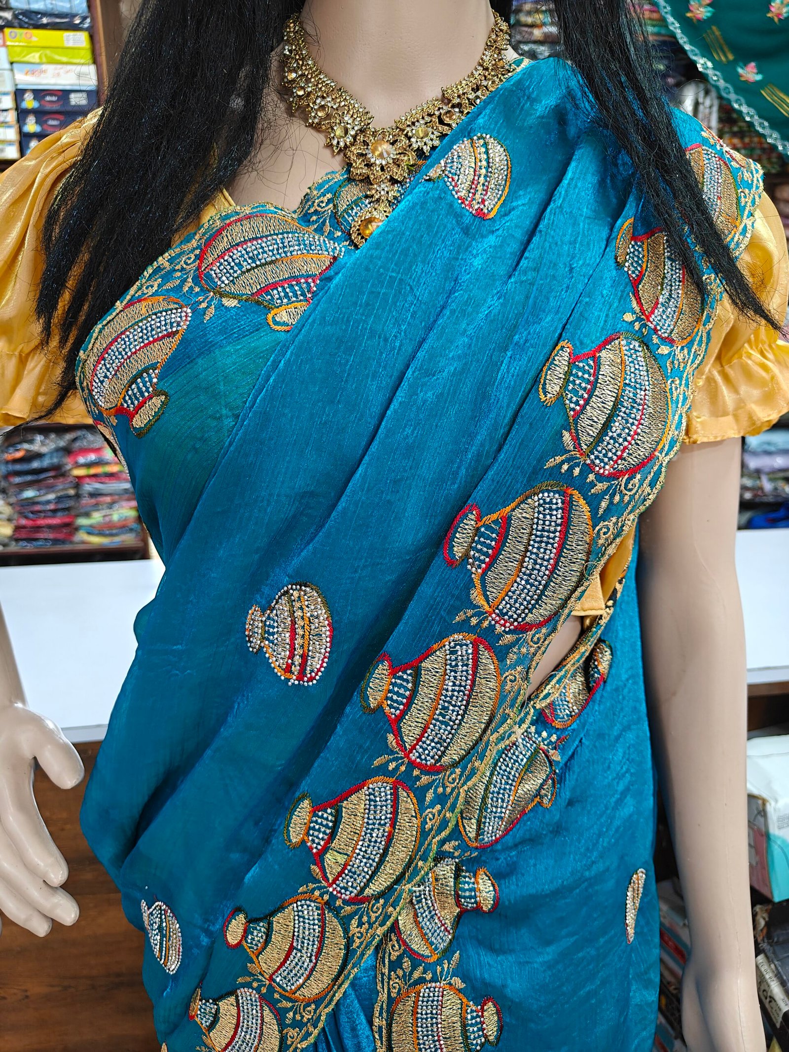 Peacock Blue Fendy Matka Design Saree with Embroidered Border - Image 2