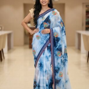 Light blue georgette saree with navy blue tie-dye pattern and stone work